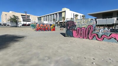 Graffitied urban area represented by gaussian splatting 
